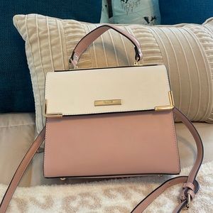 Beautiful never used pocketbook. Pink and beige. Handle or crossbody